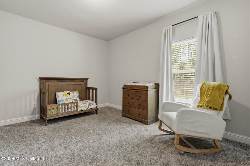 Step into this stunning 5-bedroom, 3-bathroom home offering the - photo 37