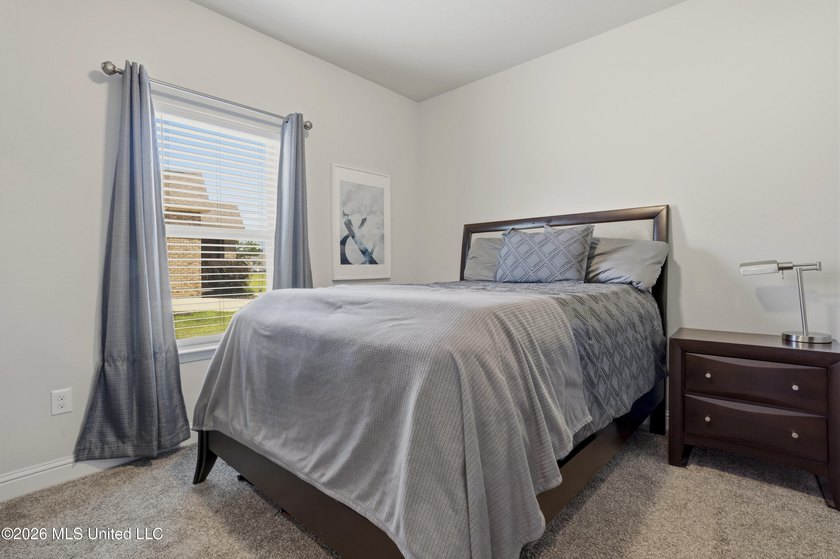 Step into this stunning 5-bedroom, 3-bathroom home offering the - photo 38