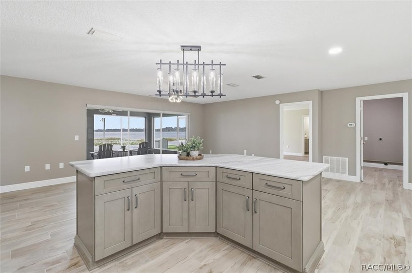 Wake up to breathtaking sunrise views over the lake in this - photo 16