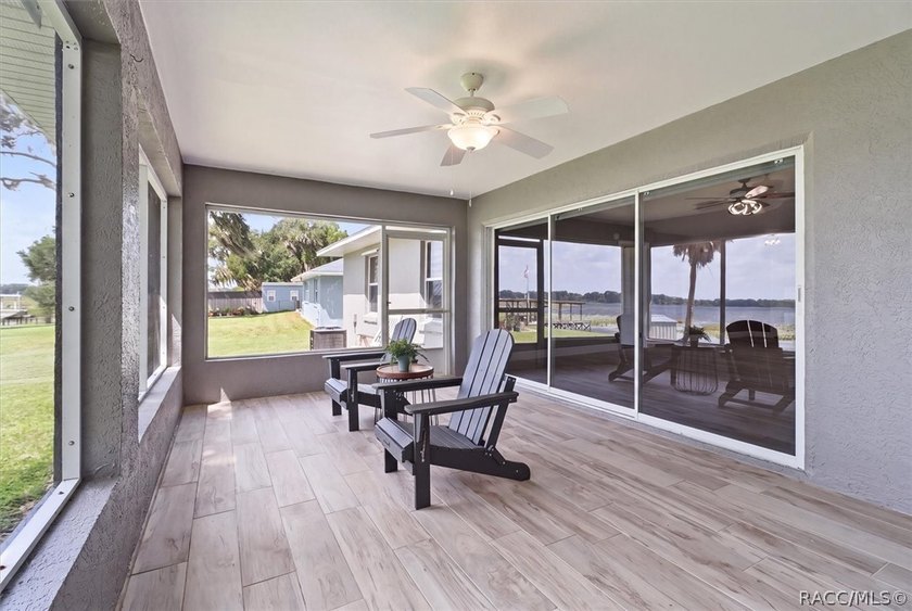 Wake up to breathtaking sunrise views over the lake in this - photo 34