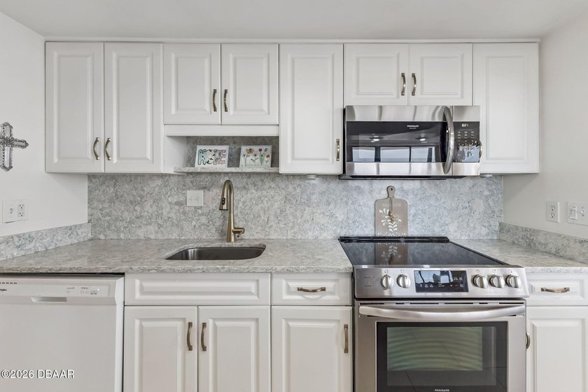 Located in a premier oceanfront community in Daytona Beach, this - photo 12