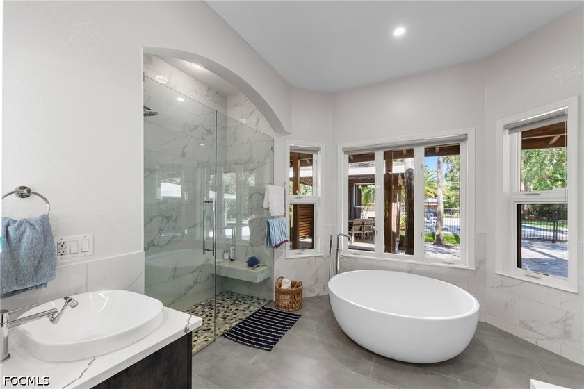 Tucked behind a private gated entrance on a lush 2.5 acre wooded - photo 23