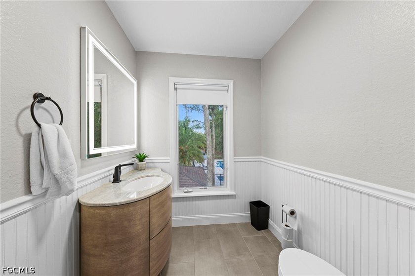 Tucked behind a private gated entrance on a lush 2.5 acre wooded - photo 30