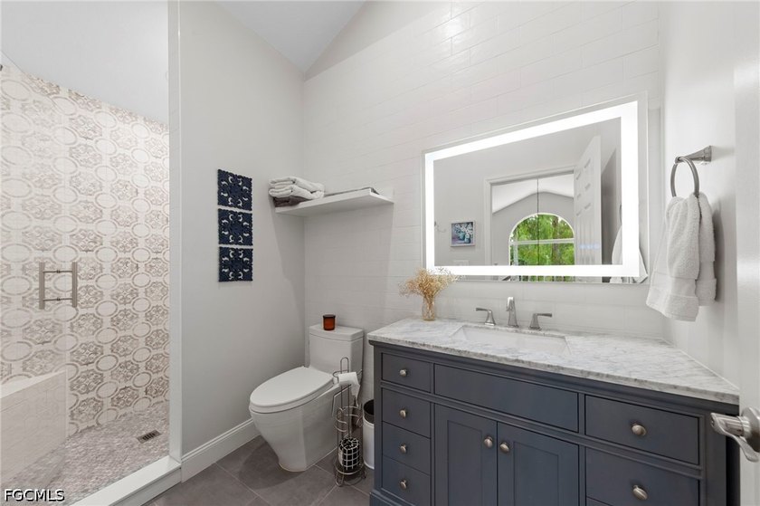 Tucked behind a private gated entrance on a lush 2.5 acre wooded - photo 34