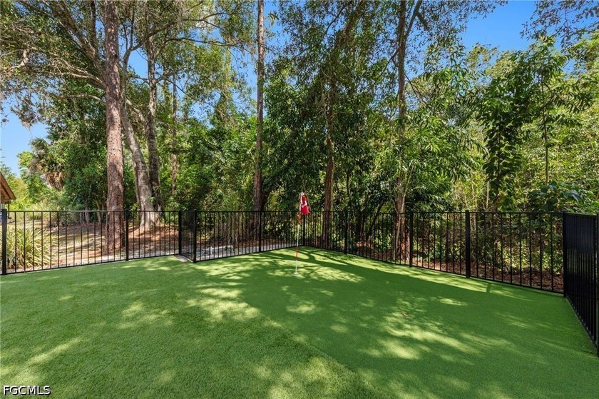 Tucked behind a private gated entrance on a lush 2.5 acre wooded - photo 41