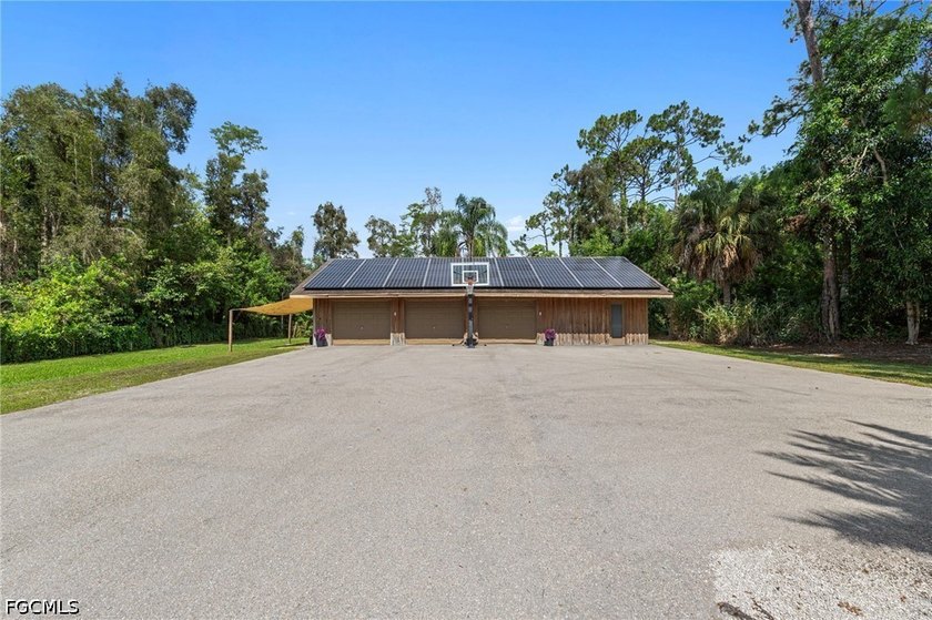 Tucked behind a private gated entrance on a lush 2.5 acre wooded - photo 46