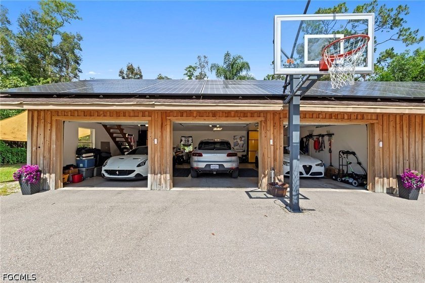 Tucked behind a private gated entrance on a lush 2.5 acre wooded - photo 49