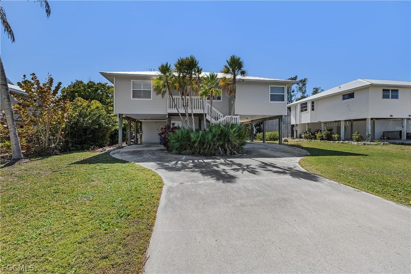 Captains Cove, 2- bedrooms 2.5- baths, Piling Home and pool at - photo 33