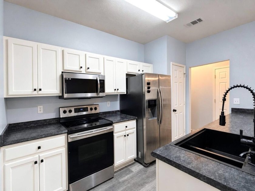 Discover this spacious two-story, three-bedroom townhome in - photo 11