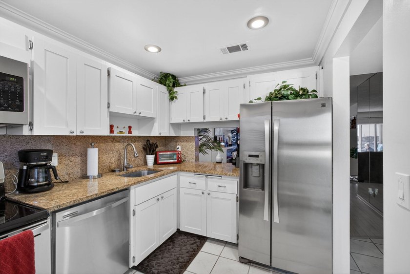 Enjoy exceptional waterfront living in this beautifully - photo 16