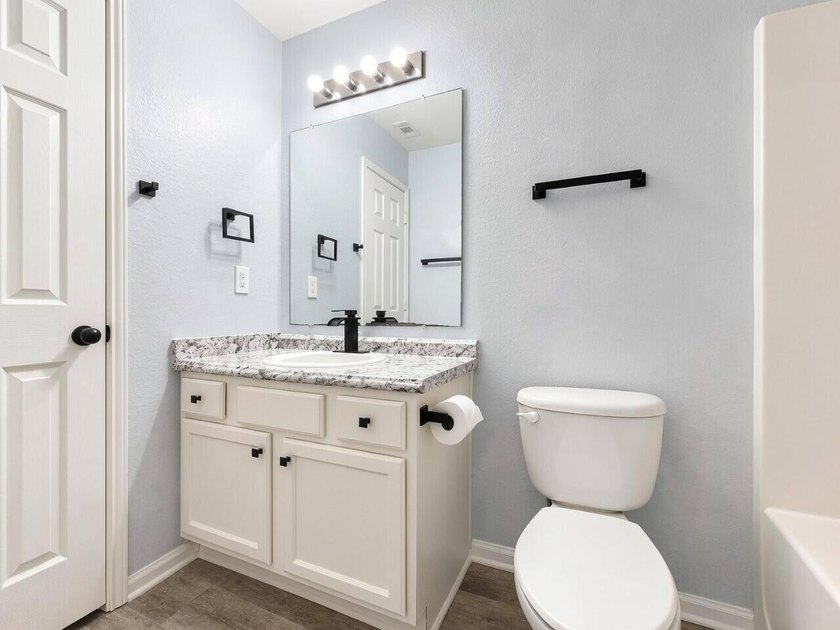 Discover this spacious two-story, three-bedroom townhome in - photo 17