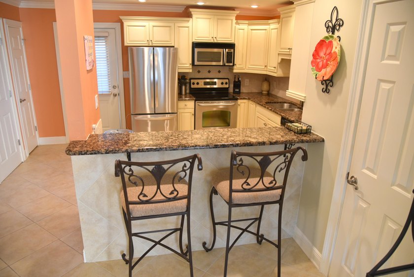 This pristine coastal retreat in Miramar Beach is steps to one - photo 18