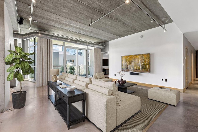 Unit 202 features a rare opportunity to own a spacious - photo 3