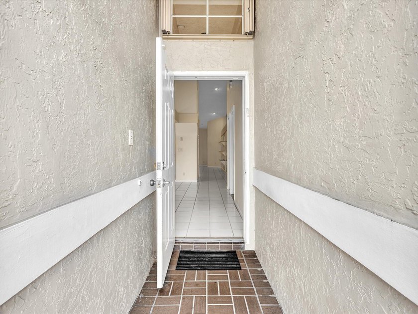 Welcome to this charming villa in Boca Raton's highly - photo 4