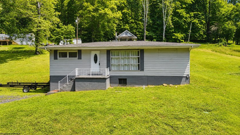 This charming 3-bedroom, 1-bath home is ideally located just - photo 2