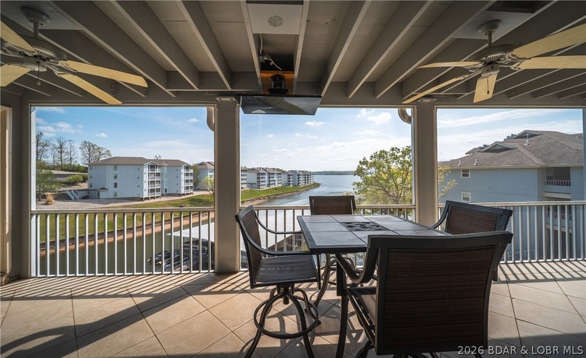 Enjoy stunning lake views from your screened-in deck overlooking - photo 13