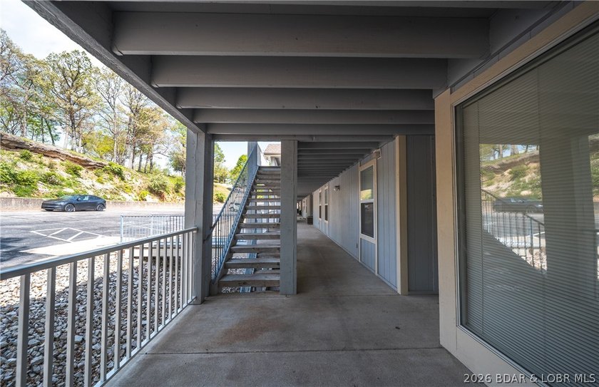 Enjoy stunning lake views from your screened-in deck overlooking - photo 32