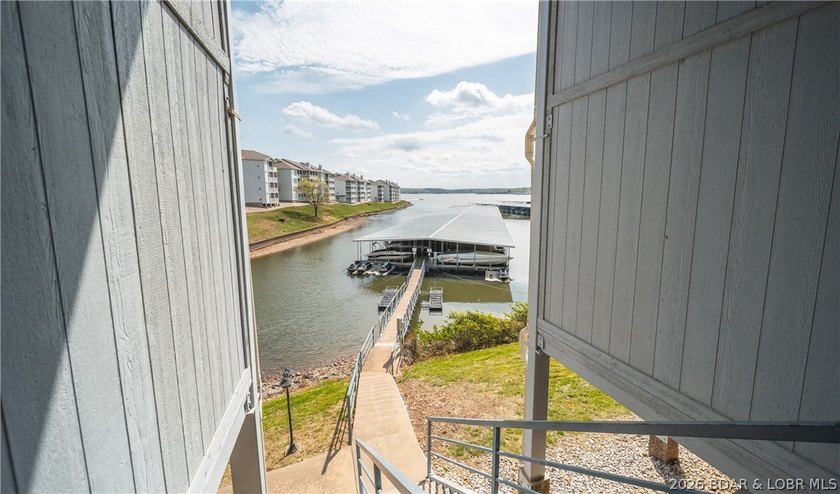 Enjoy stunning lake views from your screened-in deck overlooking - photo 34