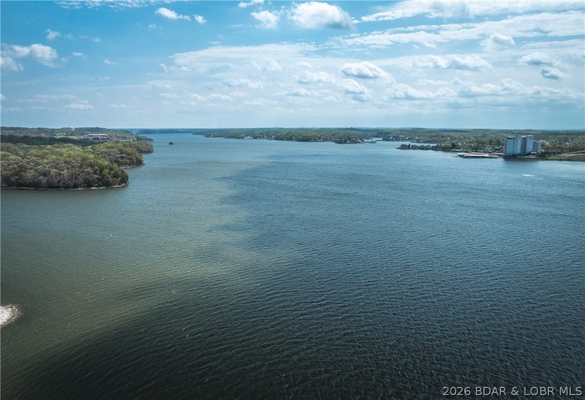 Enjoy stunning lake views from your screened-in deck overlooking - photo 47