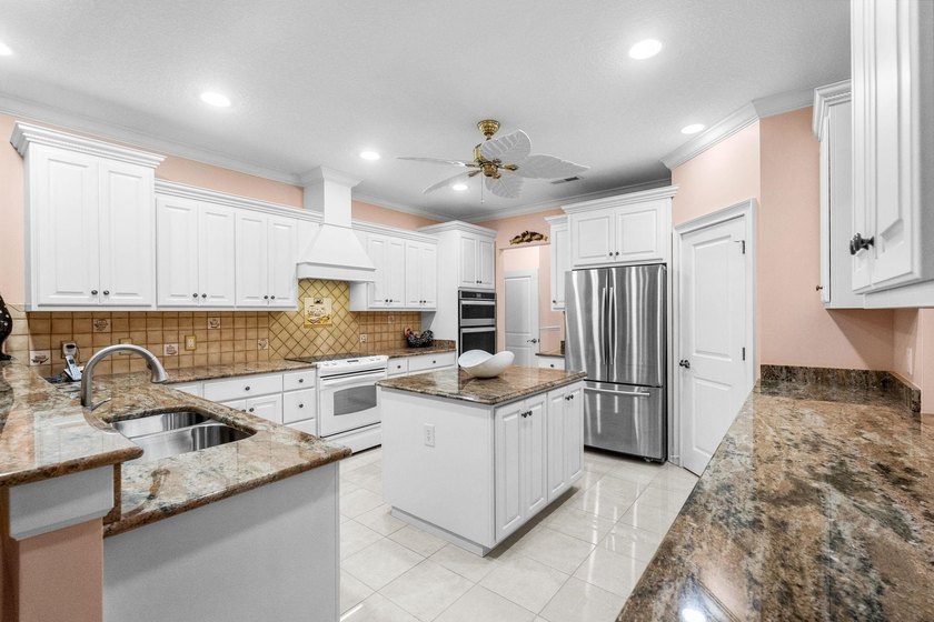 Introducing a rare opportunity to own a meticulously maintained - photo 13