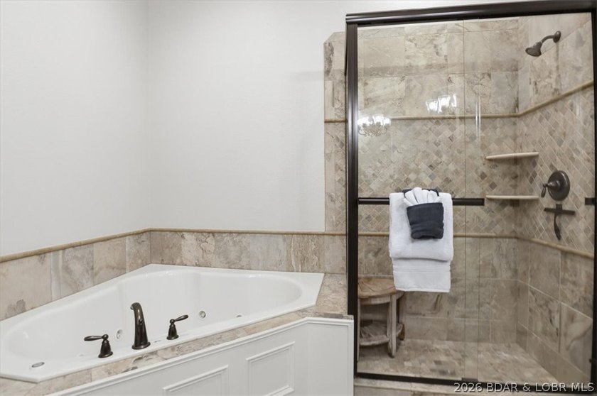 Lakefront Penthouse offers a rare 18 x 48 boat slip, partially - photo 21