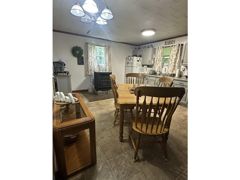 Riverfront retreat on 8 breathtaking acres! This beautiful home - photo 8