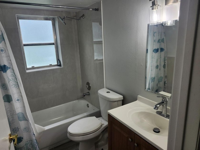 WOW!!! RARELY AVAILABLE REMODLED GROUND FLOOR CORNER UNIT - photo 11