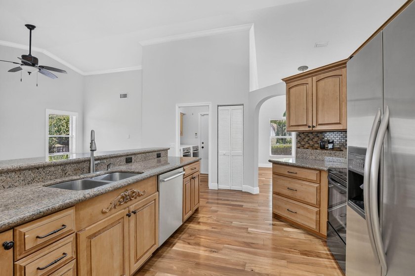 Live in one of Weston's premier gated communities, across from - photo 12