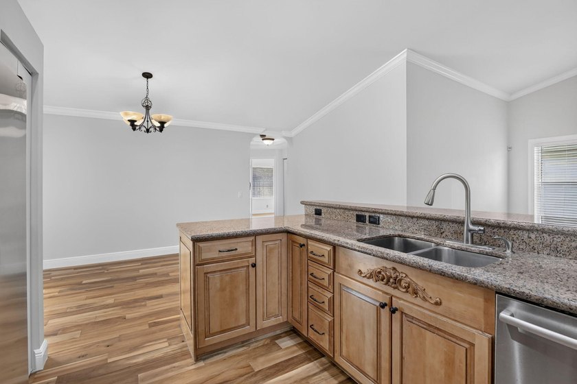 Live in one of Weston's premier gated communities, across from - photo 13