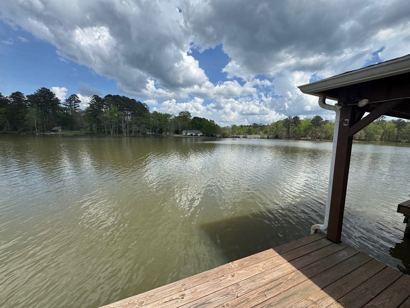 Set on nearly 100 acres of beautiful Golden Pond with easy - photo 15