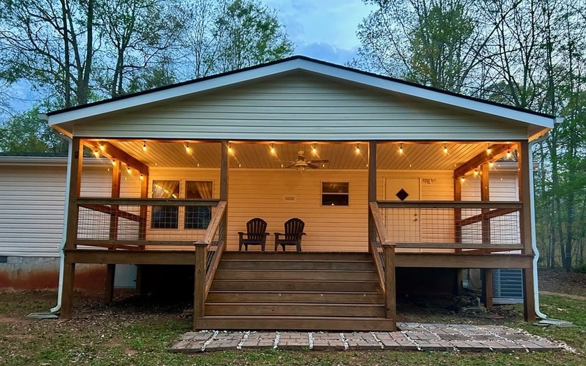 Set on nearly 100 acres of beautiful Golden Pond with easy - photo 16