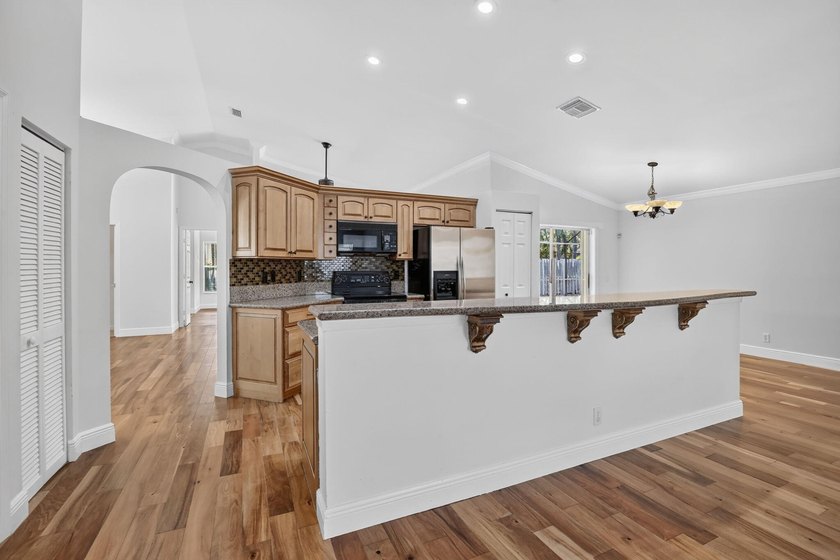 Live in one of Weston's premier gated communities, across from - photo 16