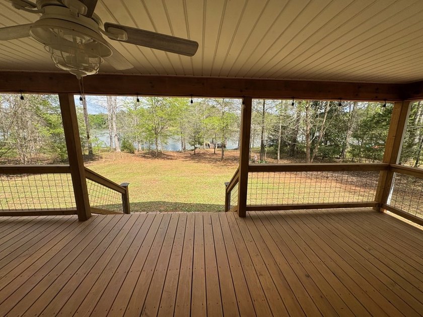 Set on nearly 100 acres of beautiful Golden Pond with easy - photo 19