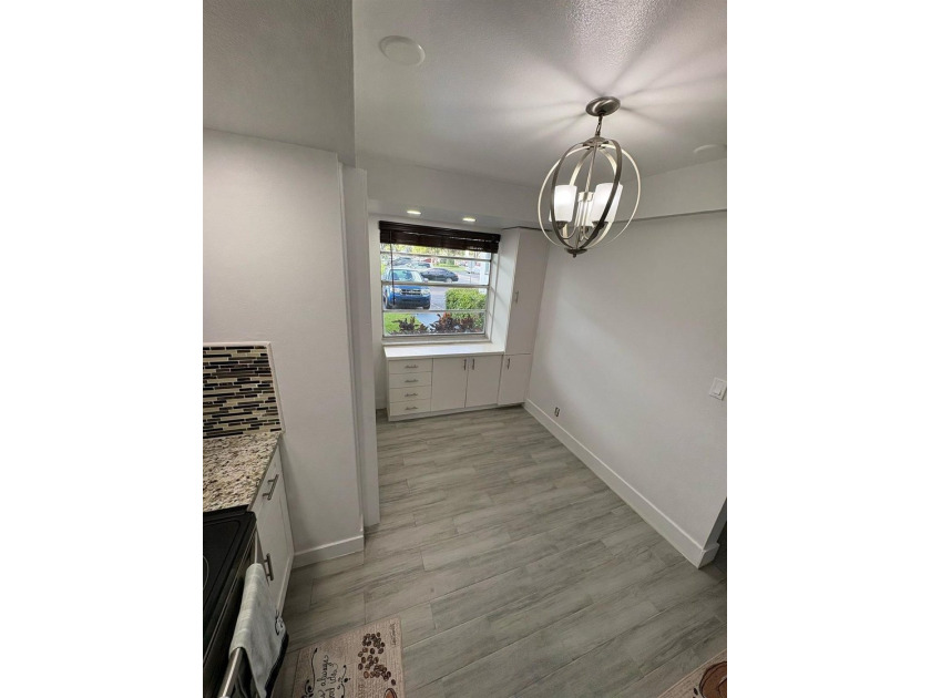 WOW!!! RARELY AVAILABLE REMODLED GROUND FLOOR CORNER UNIT - photo 19