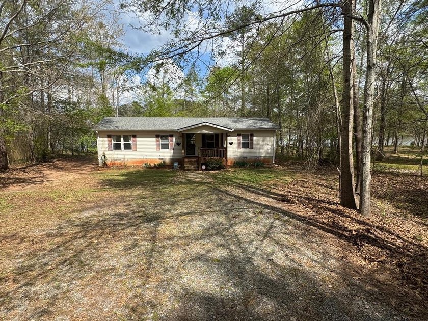 Set on nearly 100 acres of beautiful Golden Pond with easy - photo 20