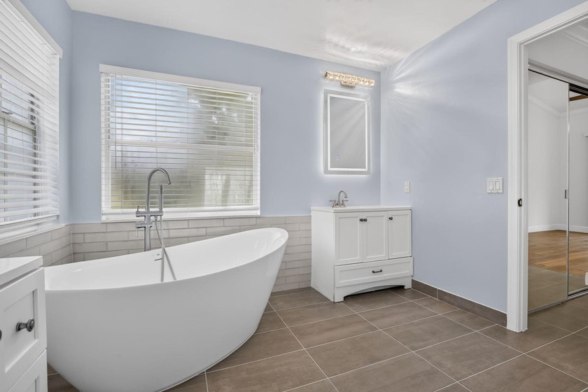 Live in one of Weston's premier gated communities, across from - photo 28