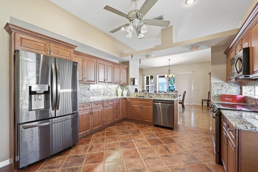 Welcoming double-door entry and open layout Bright kitchen - photo 9