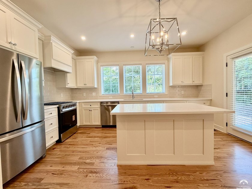 This newly constructed two-story townhome offers quality - photo 2