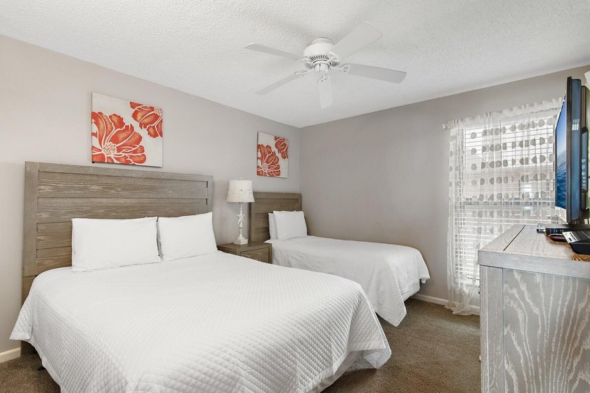 Jetty East is a Gulf front Gated 6-story midrise with under - photo 18