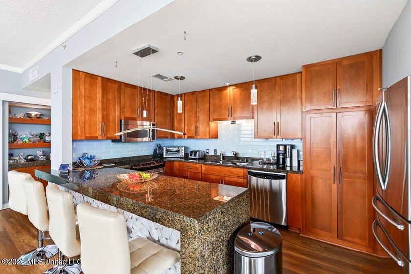 This beautifully updated 12th-floor end unit at Ocean Club - photo 12