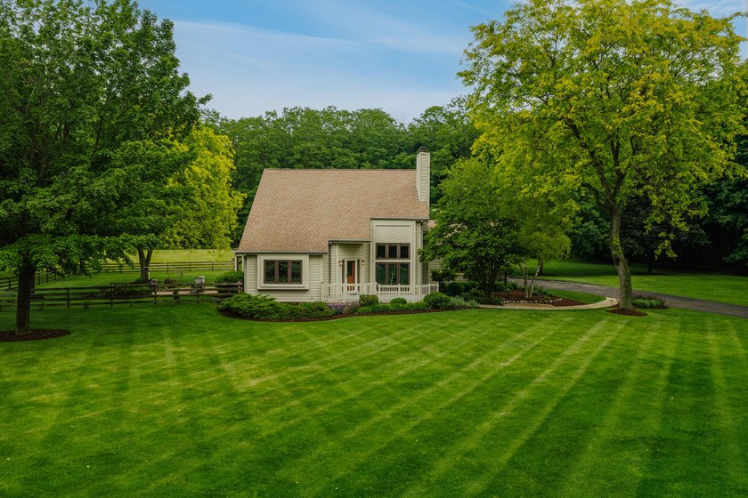 Space, serenity, and sensational design meet at W1818 Lake Rd! - photo 5