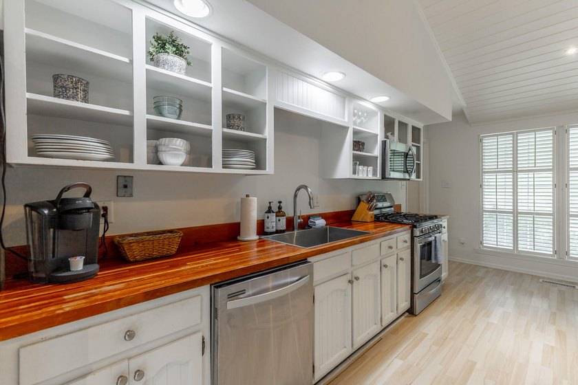 Welcome to 1043 Clift Cave Drive, where breathtaking waterfront - photo 27