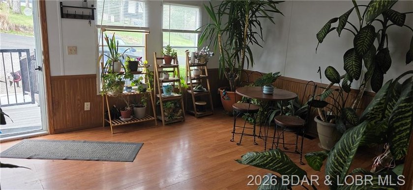 Large lakefront family home tucked back in a protective cove for - photo 12
