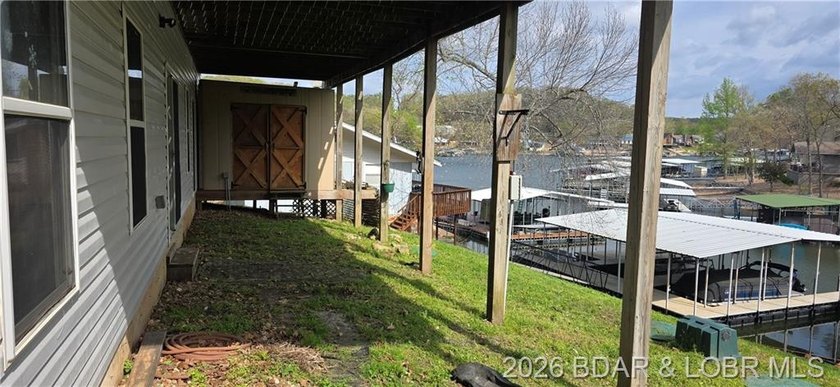 Large lakefront family home tucked back in a protective cove for - photo 23