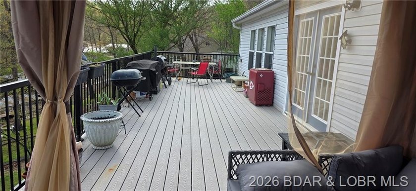 Large lakefront family home tucked back in a protective cove for - photo 44