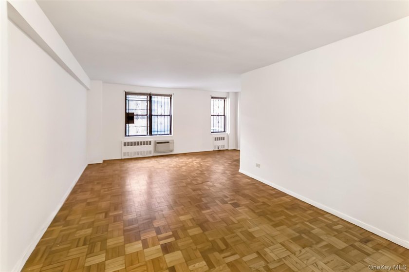 Come see this oversized alcove studio with extremely low - photo 2