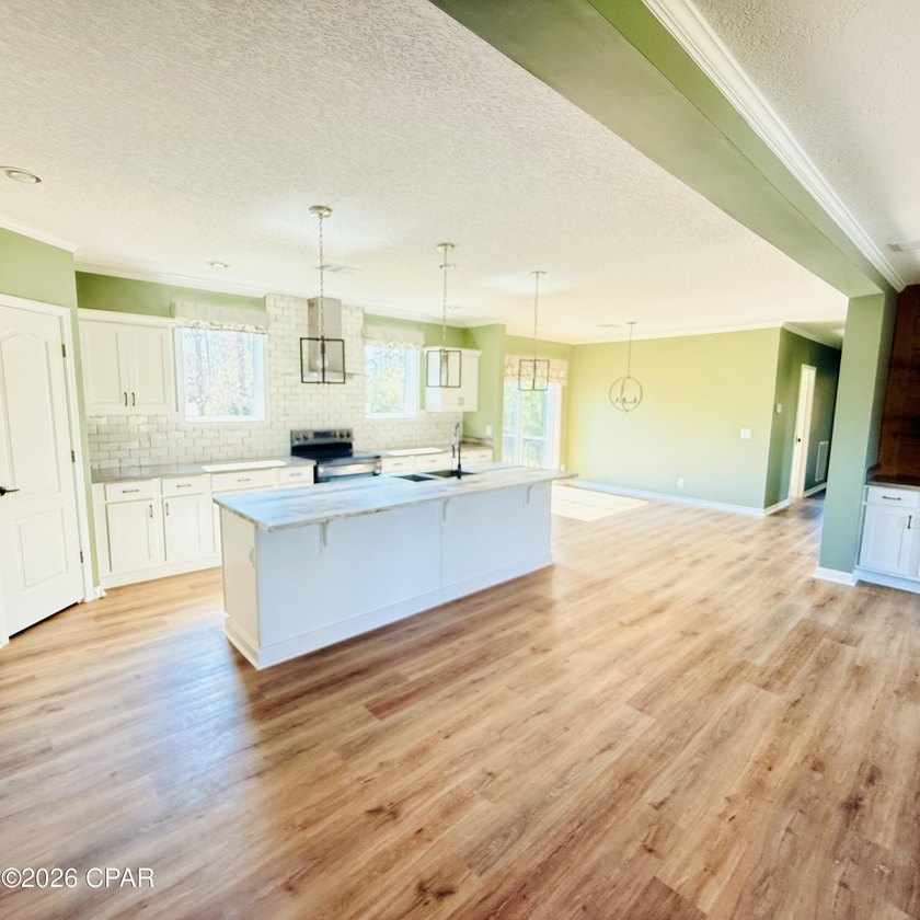 HUGE PRICE IMPROVEMENT.... Seller is ready to sell. At $135/sqft - photo 11