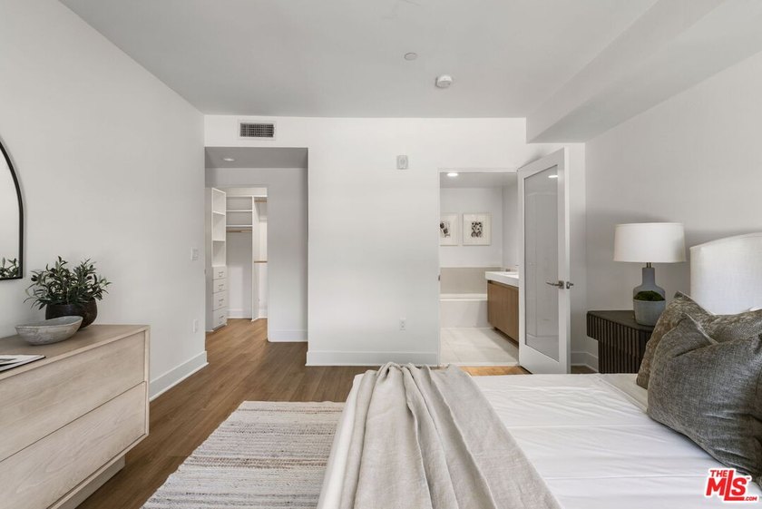Stunning newer contemporary condo right across the street from - photo 15