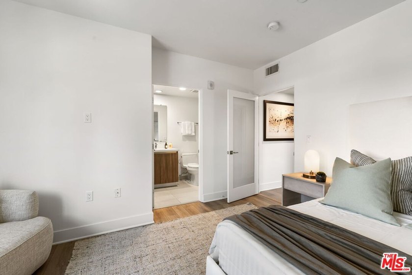 Stunning newer contemporary condo right across the street from - photo 20