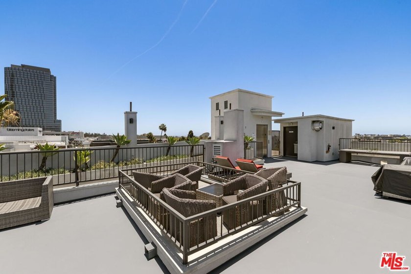 Stunning newer contemporary condo right across the street from - photo 24